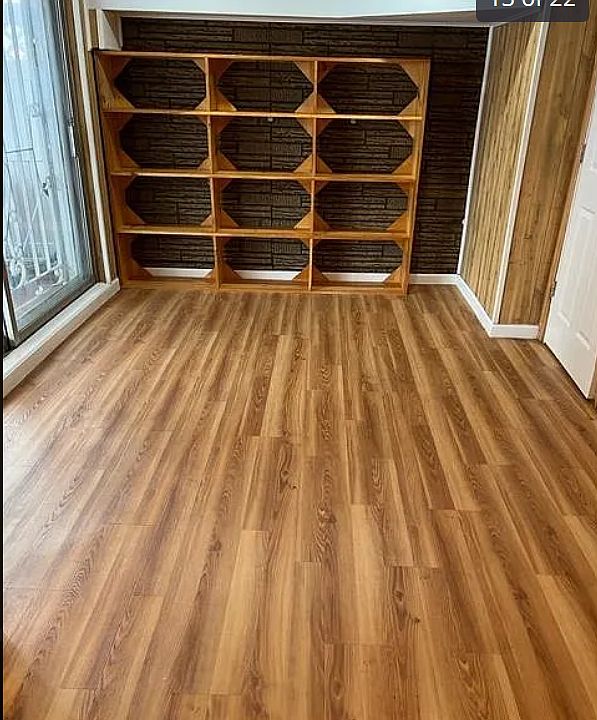 builtin shelving in large bedroom