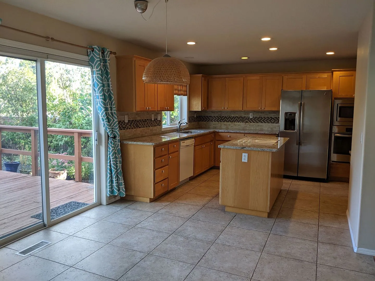 Spacious 4 Bedroom Home with Bay Windows, Open Kitchen, Two Living Areas & Private Deck — Photo 3