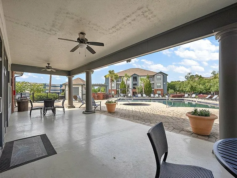 Shaded Poolside Lounge at Eagle Flatts Apartments in Hattiesburg, MS