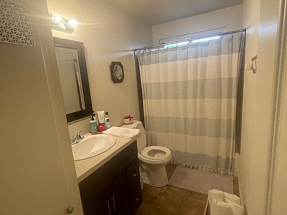 Second bathroom with tub shower