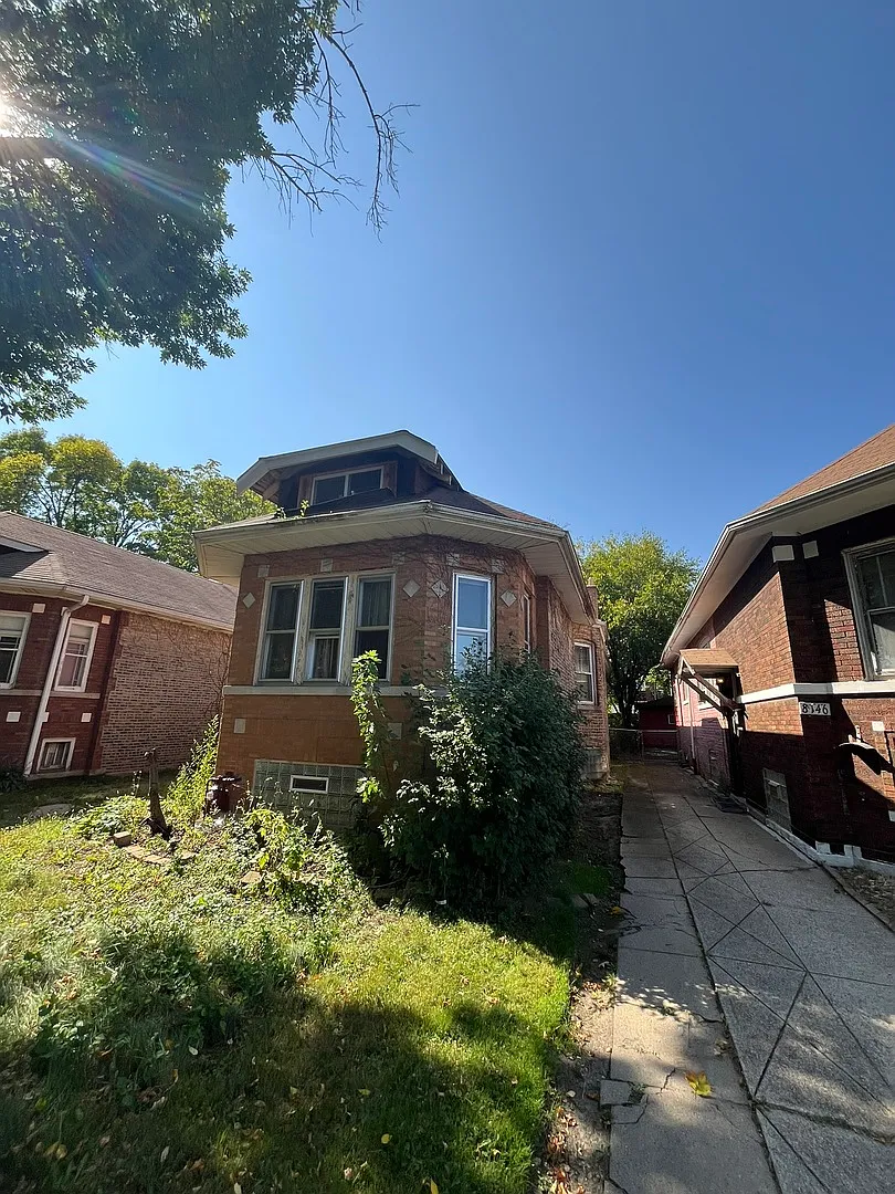 8150 S Oglesby Ave photo 1