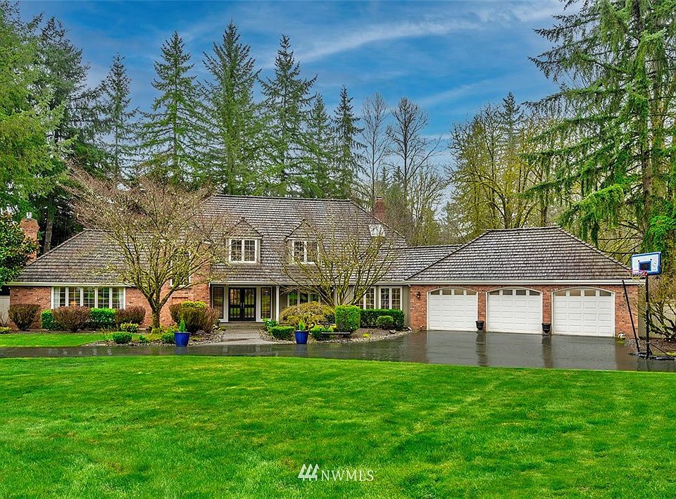Exciting Hunter's Glen opportunity by John F. Buchan. The quintessential circular driveway and enormous 5-car tandem garage add striking street appeal