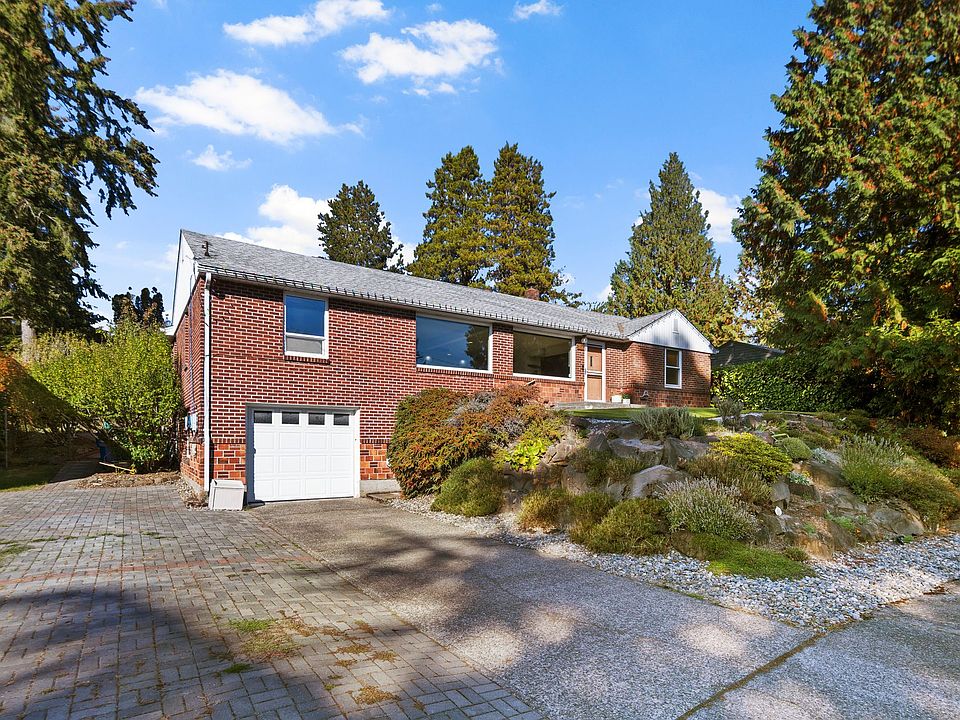 So much parking! one car garage and shop with fully finished flooring, rv side parking and driveway!