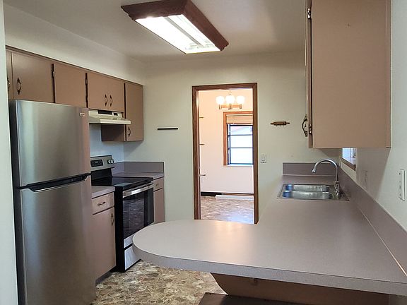 kitchen - stainless steel appliances, garbage disposal