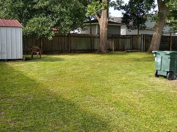 Large Back Yard with storage shed