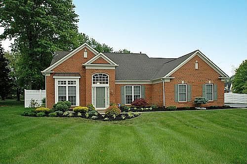 Brick front & beautifully landscaped