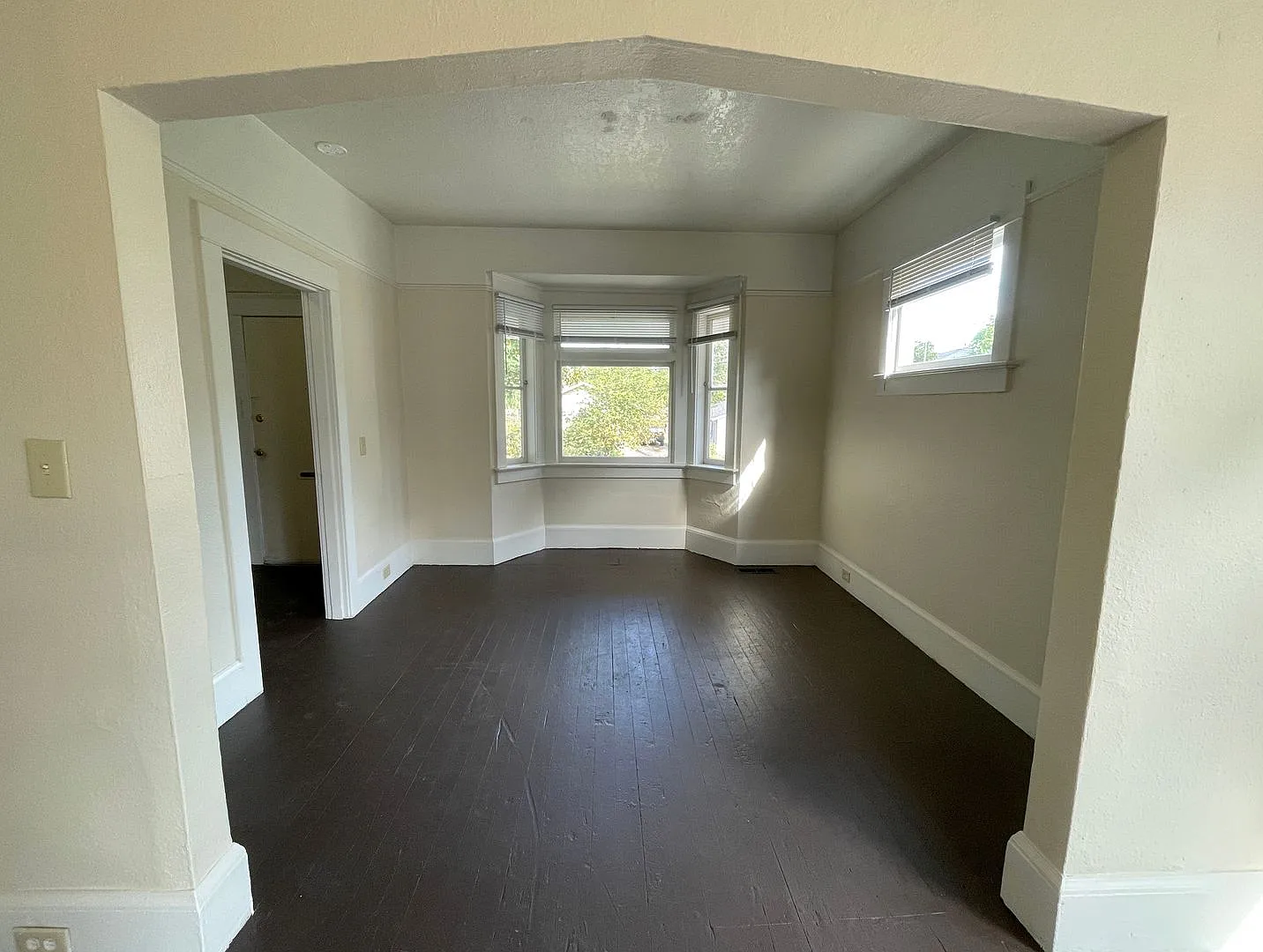 Classic Farmhouse-Style 4-Bedroom with Covered Porch, Huge Windows, Fenced Yard — Photo 3