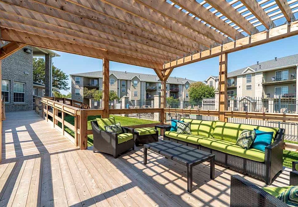Our new pergola with lounge seating creates the perfect space for outdoor socializing.