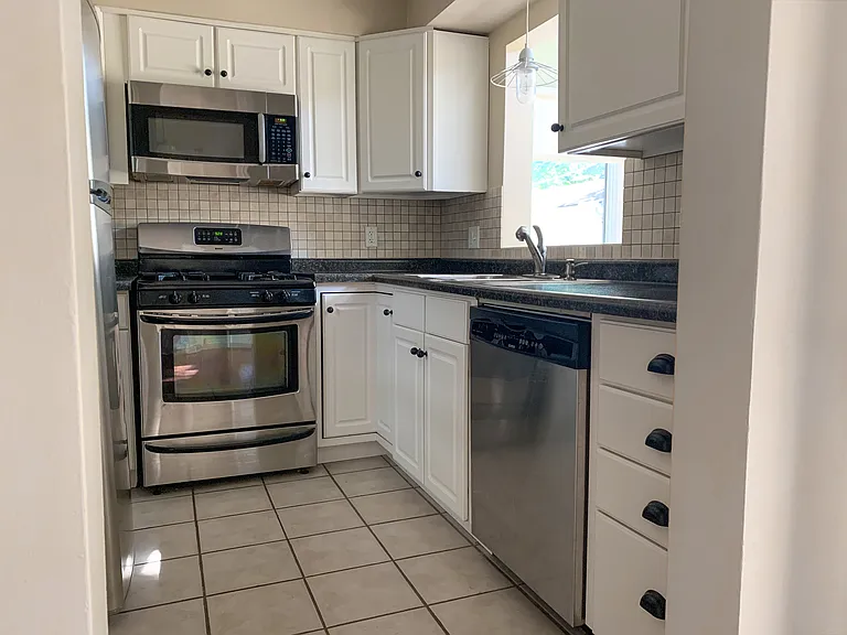 Kitchen - Stainless appliances, new refrigerator 2024.