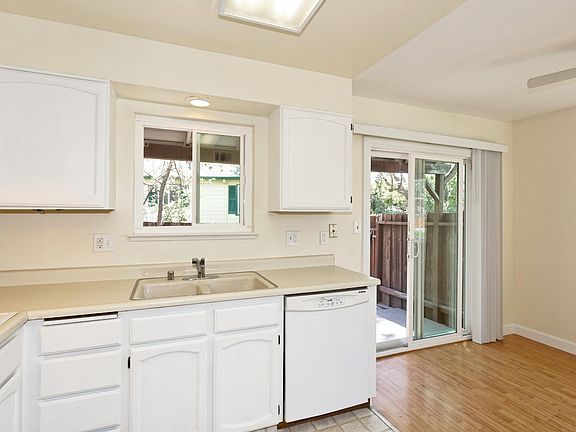 Kitchen/Dining Area/Back Patio (new hardwood floors not shown)