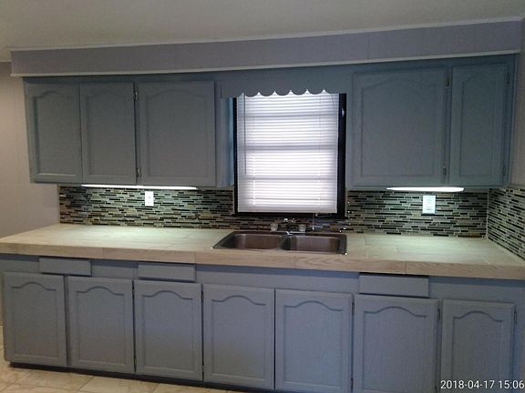 Under cabinet lighting and lots of cabinet space