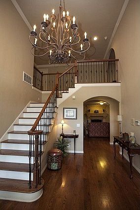 Beautiful chandelier in 2 story entry
