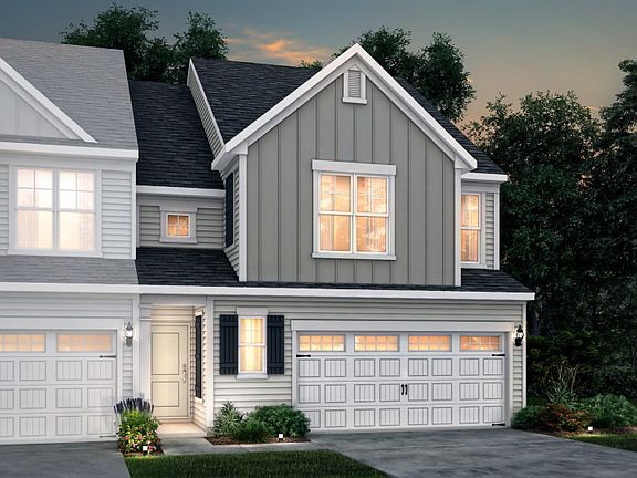 Palomino Exterior 3 features siding, covered front door and 2-car front load garage