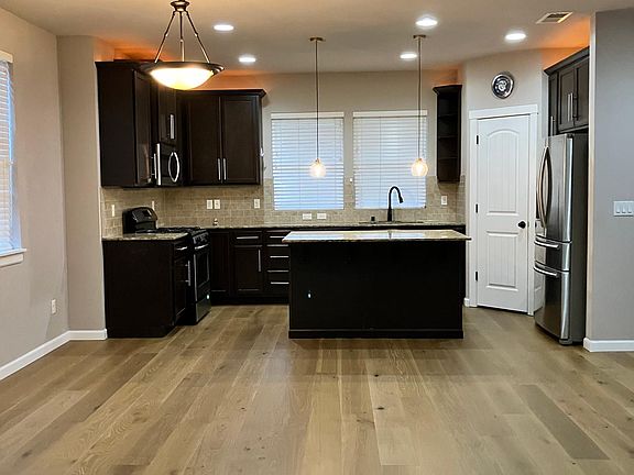 Glimpse of kitchen after brand new hardwood floor installation