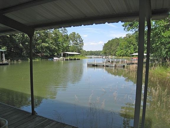 Covered slip dock on good water.