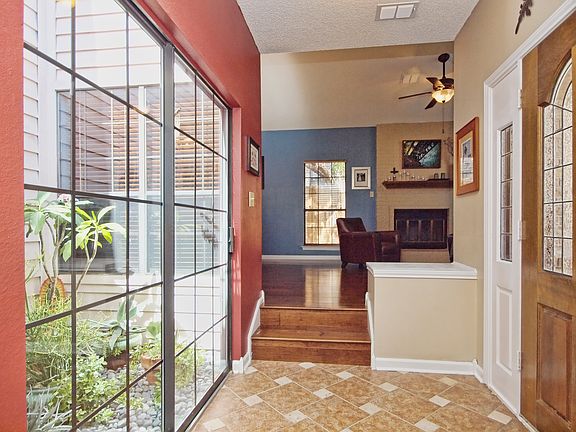 Foyer + Solarium (looking to
