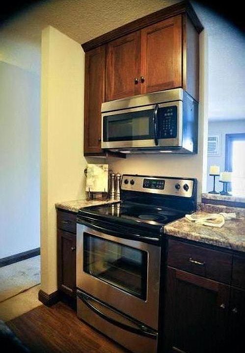 Stainless appliances in open kitchen floor plan