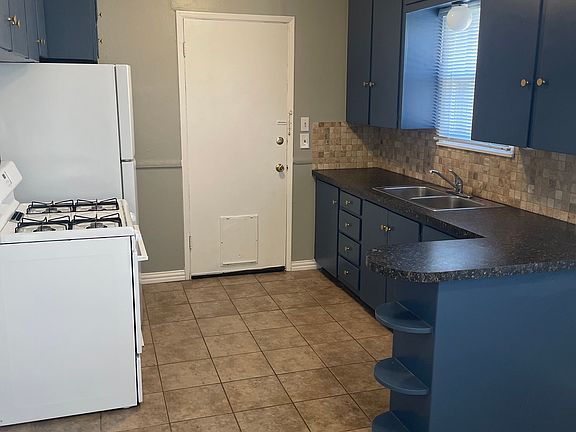 Kitchen with plenty of storage and room for an island or chopping block!