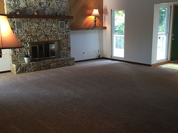 Rock fireplace in living rm