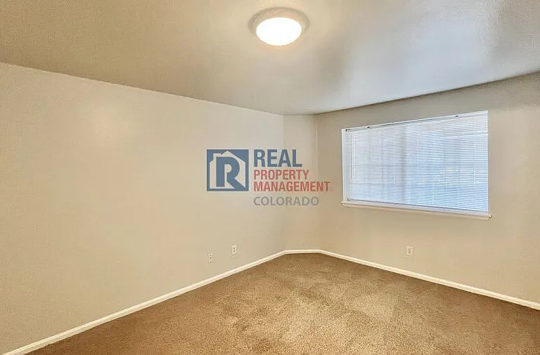 10784 W 63rd Pl #103 — Photo 15