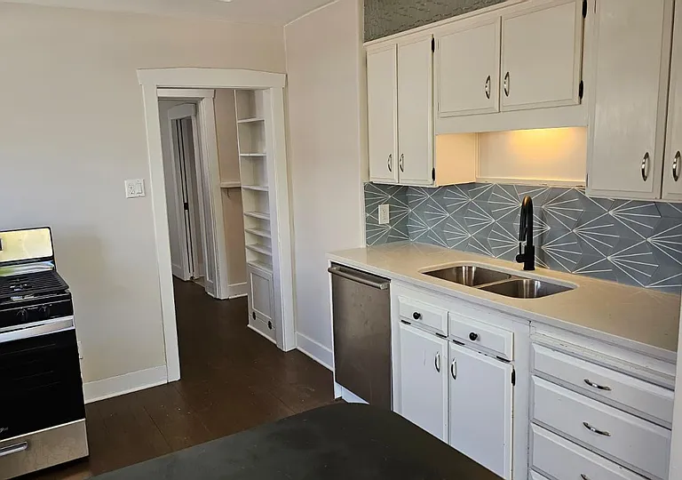 Updated Kitchen with Restored Floors, New Stove, Counter and Backsplash