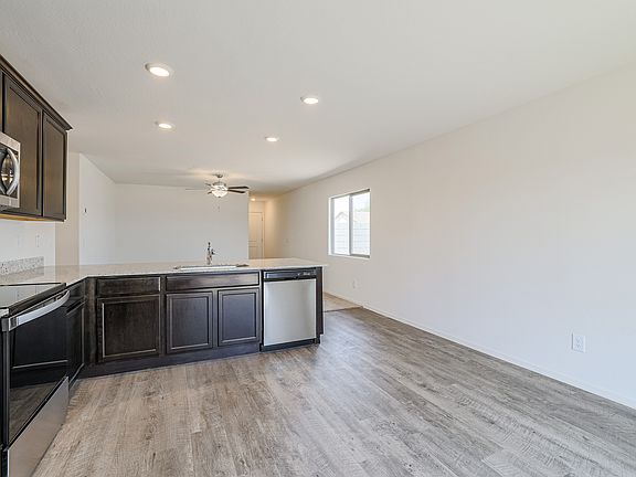 Open-concept layout, with the kitchen overlooking the family room.