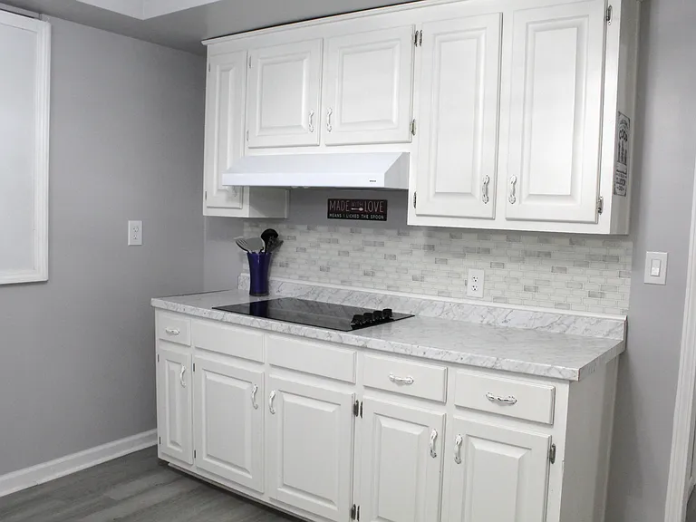 A separate cook top and lots of counter space for prepping your meals. Various cooking supplies are included.