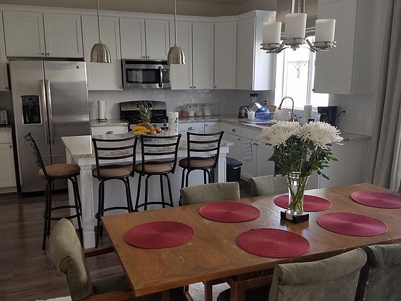 Modern kitchen with granite, stainless steel appliances and great natural daylight.