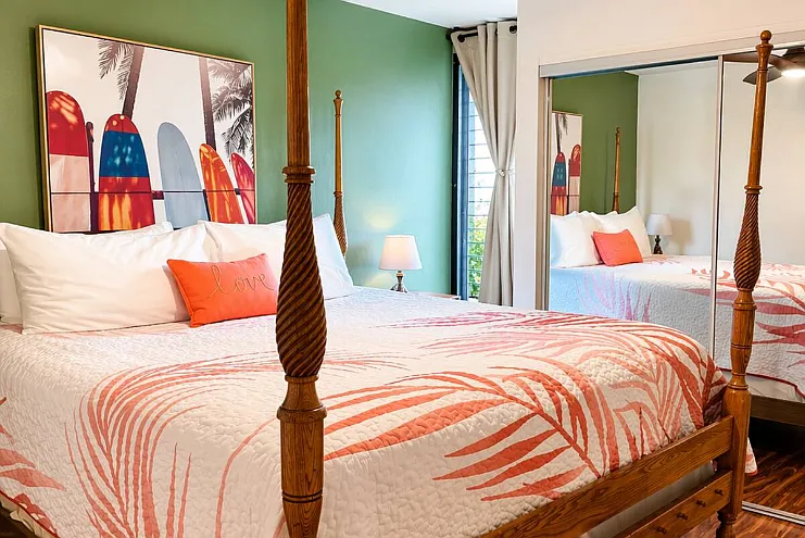 King size bed w/ AC and ceiling fan.