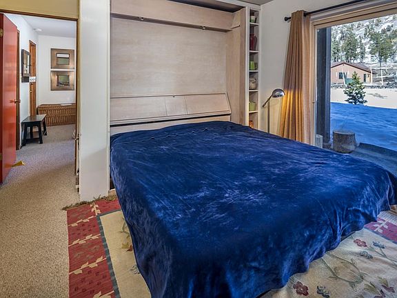 Wall bed open in living area