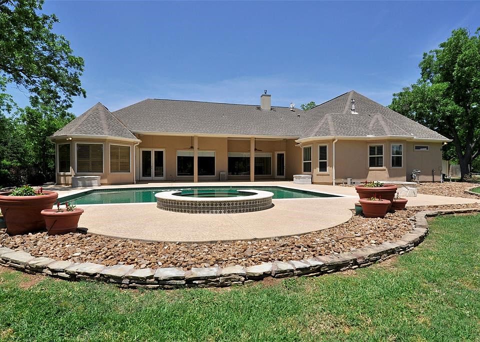 The back of this home shows what a great entertaing home it is!