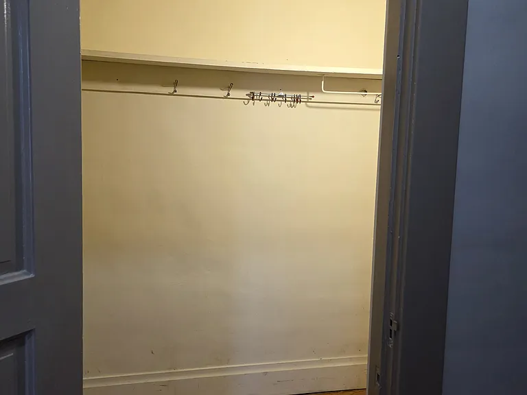 Walk-in closet upstairs hall.