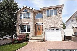 center hall colonial w/master bedroom suite & full finished basement