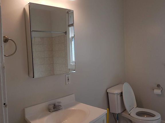 New medicine cabinet and fixtures