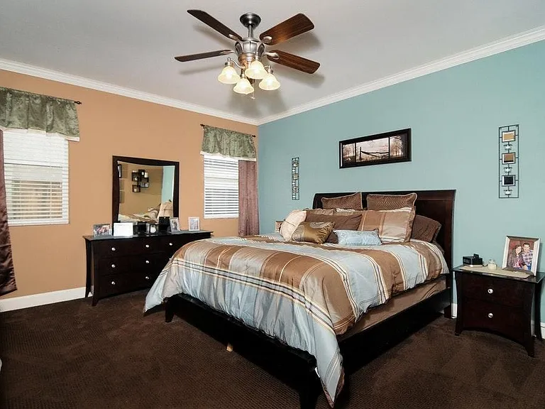 master bedroom. Has been painted (no longer 2 tone) and has new carpet.