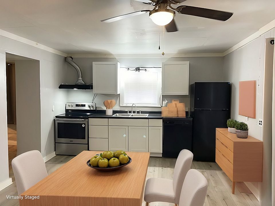 Kitchen comes with full set of appliances - Stove, dishwasher and refrigerator. Virtually staged