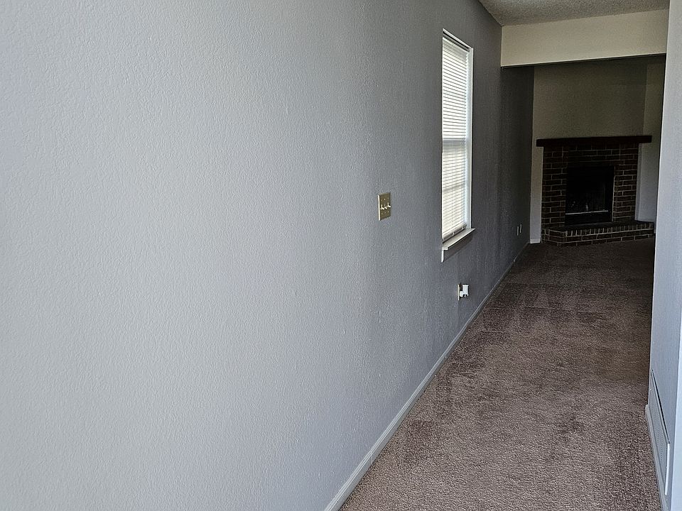 Entry showing fireplace