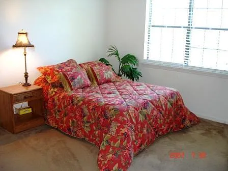 Bright sunny views of the beach! Note: Has been upgraded to hardwood flooring.