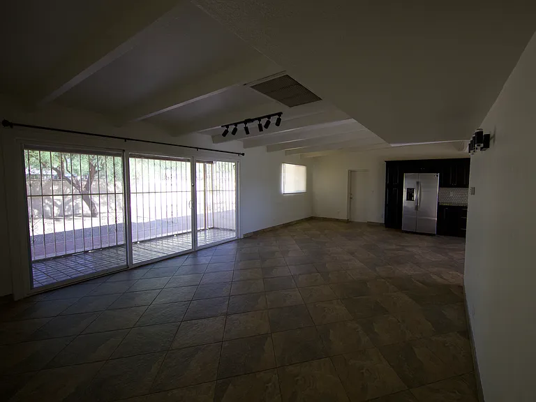 Living room looking down the hall toward the kitchen