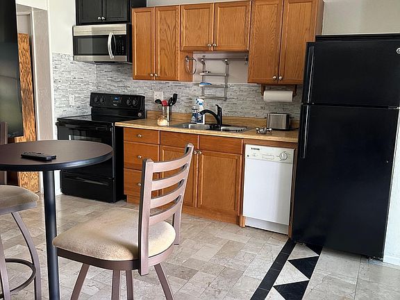 Full Size Kitchen with dishwasher and electric stove- Dishes, etc. Furnished