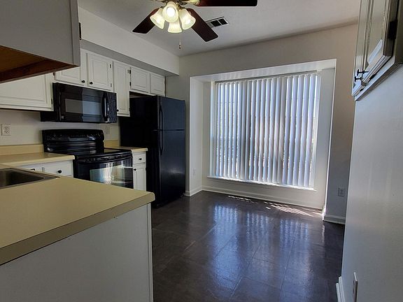 Kitchen with room for moveable island or small table and chairs