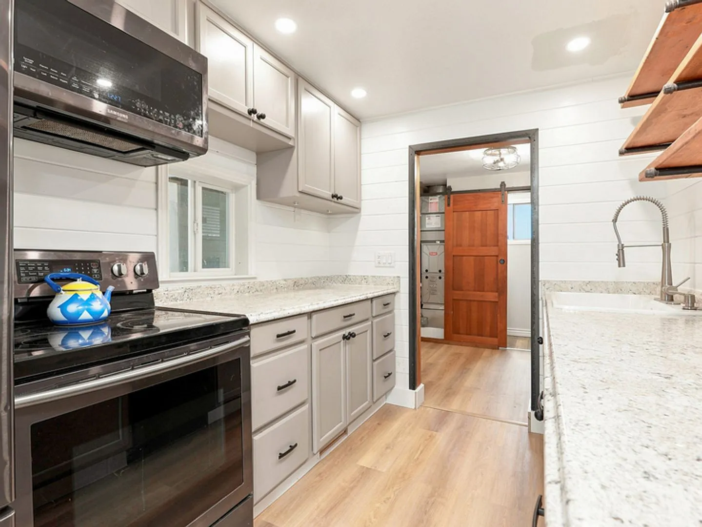 Updated Rambler with covered patio and large detached garage. — Photo 3