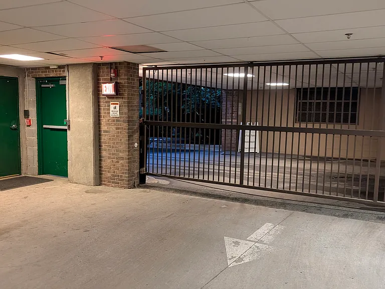 Access controlled garage with dedicated unit parking.