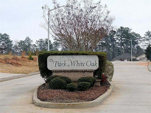. . & follow to section of homes tucked in back, The Park at White Oak.