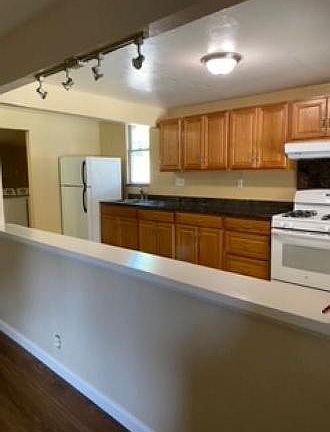Livingroom opening to kitchen
