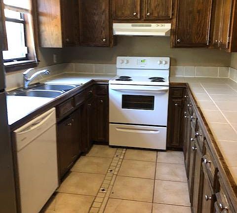 Kitchen with Lots of Cabinets. Tile floors