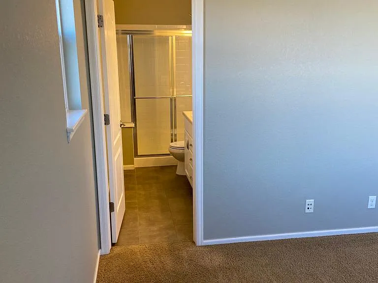 Master bed with en-suite bathroom
