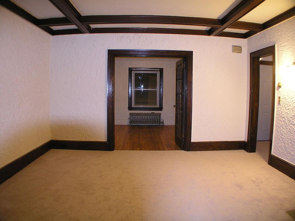Living room with French doors to bedroom