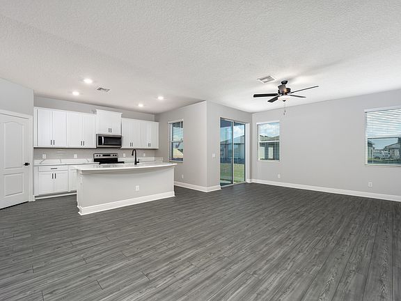 View this home s open floor plan, making the hub of the home well connected.