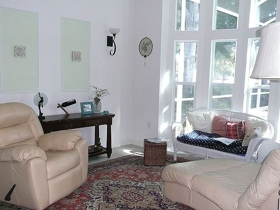 sunroom looking at pool/golf